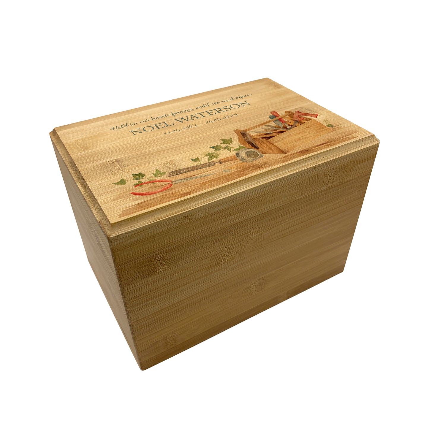 A beautifully crafted solid Bamboo wooden urn, personalised and finished with a soft watercolour design of a tool box, for the person who always fixed things. Great for Dad, Grandad, Brother, Son, Uncle.  Thoughtfully made for either display or burial, this personalised urn can be customised to create a meaningful memorial. Perfect for holding ashes of a loved one or a beloved pet, it serves as a comforting tribute and keepsake. 