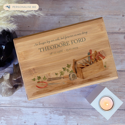 A beautifully crafted solid Bamboo wooden urn, personalised and finished with a soft watercolour design of a tool box, for the person who always fixed things. Great for Dad, Grandad, Brother, Son, Uncle.  Thoughtfully made for either display or burial, this personalised urn can be customised to create a meaningful memorial. Perfect for holding ashes of a loved one or a beloved pet, it serves as a comforting tribute and keepsake. 