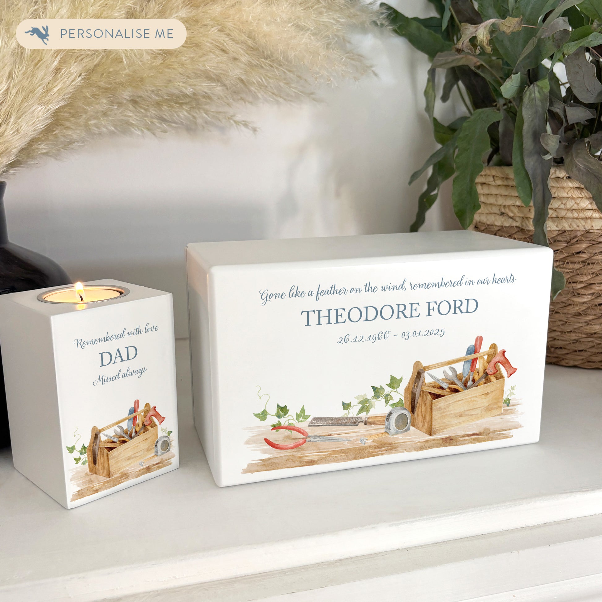 A beautifully crafted solid wooden urn, finished in white with a soft watercolour design Dads, Grandads, uncles, Brothers tool box, Thoughtfully made for either display or burial, this personalised urn can be customised to create a meaningful memorial. Perfect for holding ashes of a loved one or a beloved pet, it serves as a comforting tribute and keepsake.