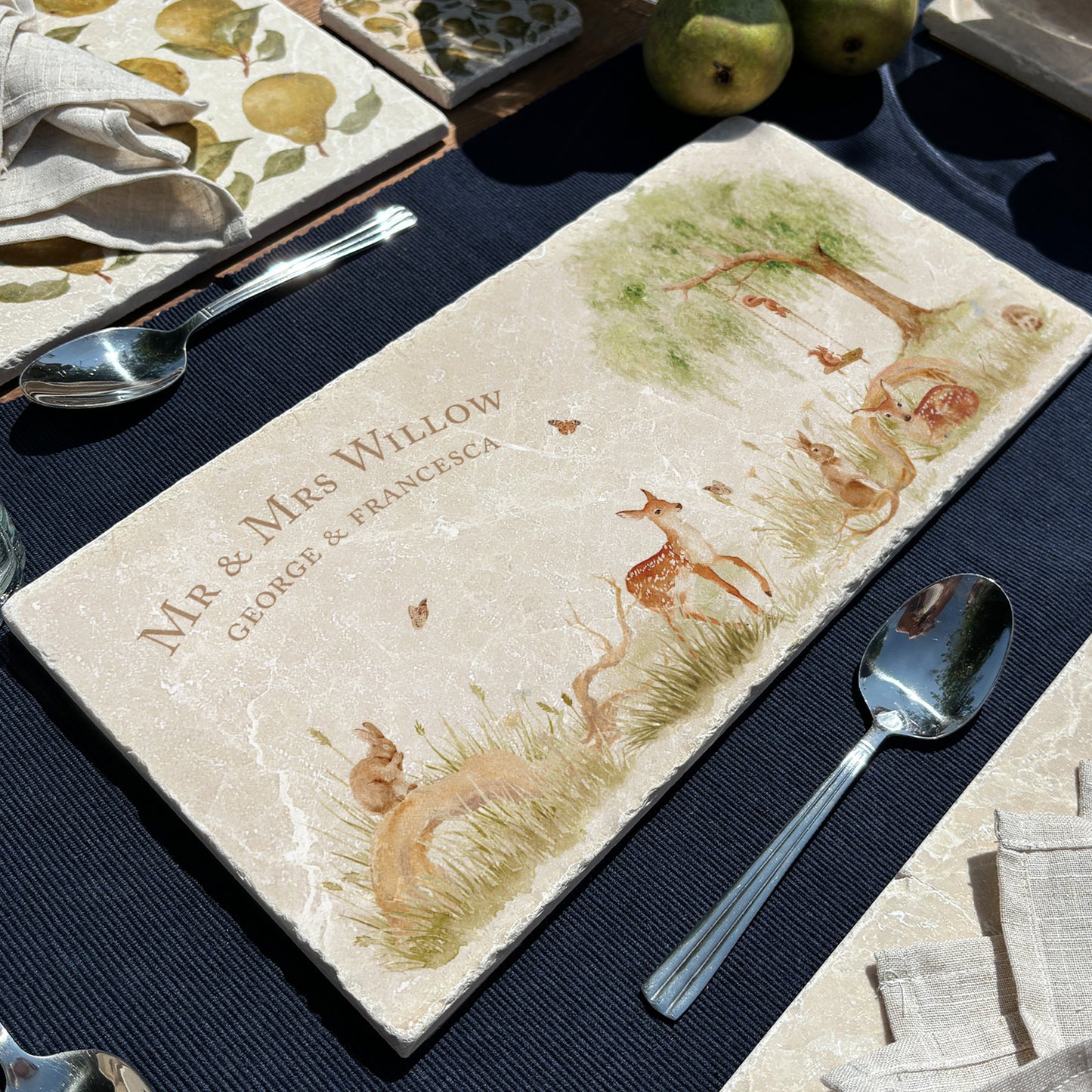 A personalised marble sharing platter with a willow tree and woodland animal watercolour design. Create a personalised serving platter, trivet or cheeseboard as a luxury gift.