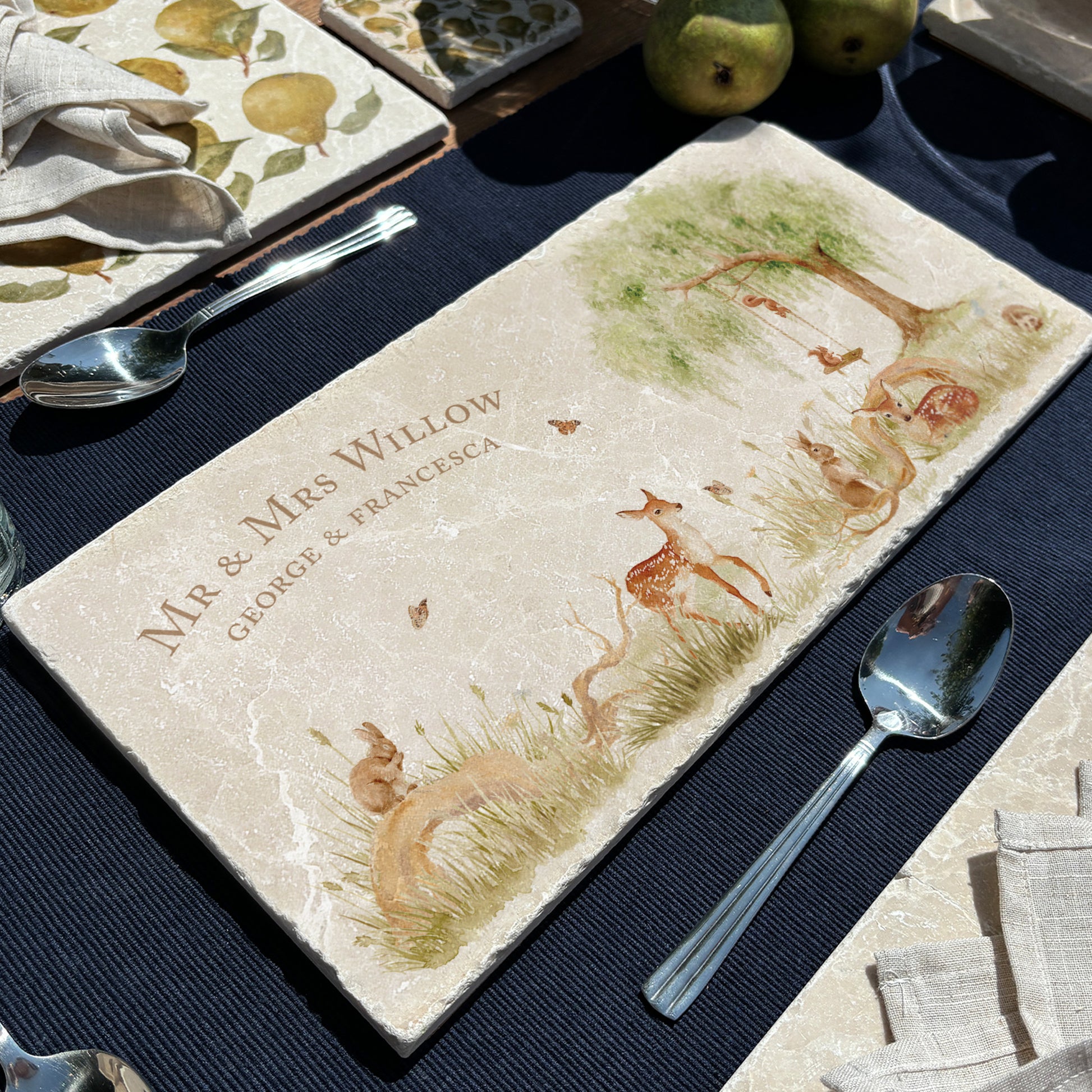 A personalised marble sharing platter with a willow tree and woodland animal watercolour design. Create a personalised serving platter, trivet or cheeseboard as a luxury gift.