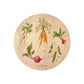 Round beech wood chopping board featuring a watercolour pattern of beetroot, carrots, parsnips, runner beans and radishes.