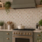 Mosaic tile showing a mixed vegetables painted in s watercolour design 