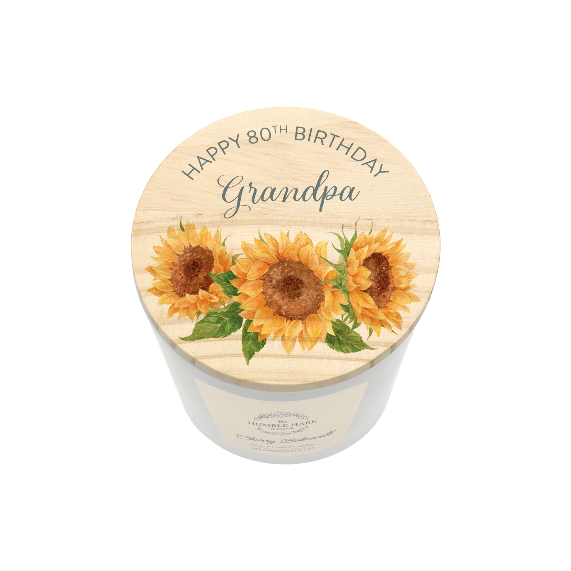 A personalised white glass candle jar with a light wood lid with an illustration of a sunflower and the words Happy 80th Birthday Grandpa.