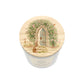 A white glass candle jar with a light wooden lid illustrated with a rose arch to a hidden garden with rabbits and wildlife hidden in the leaves. 