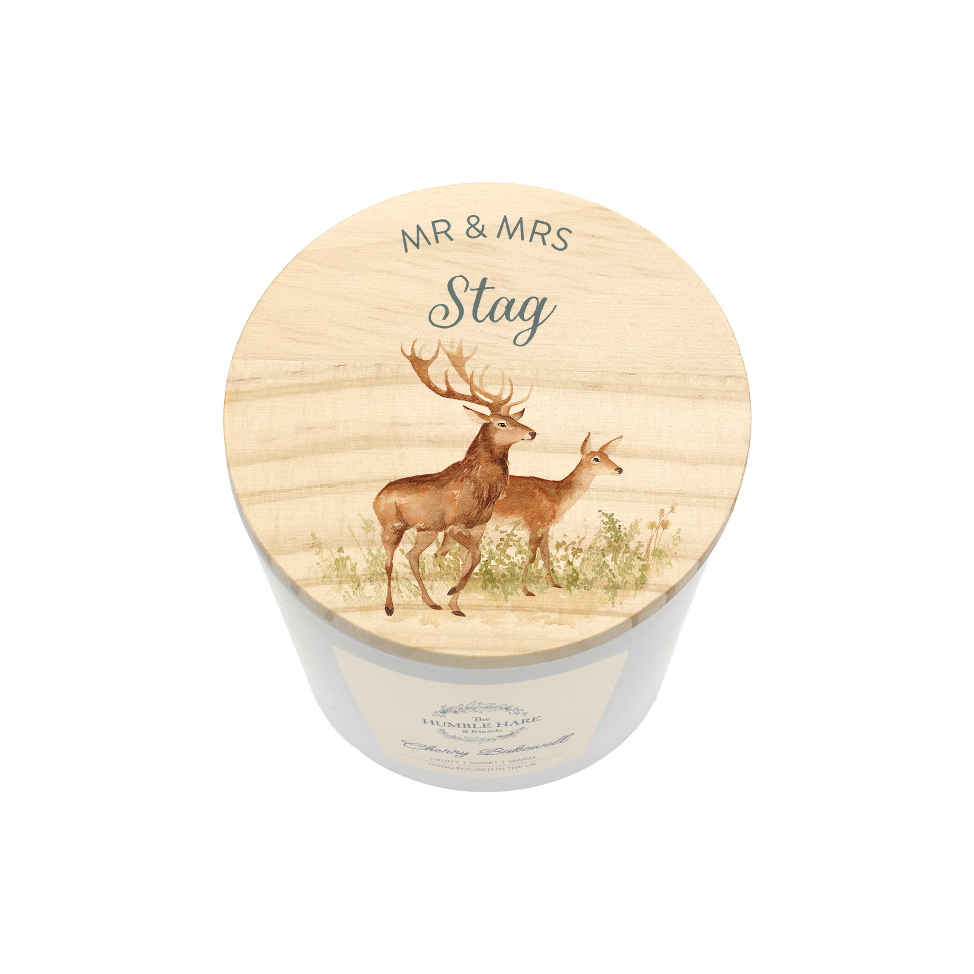 A personalised white glass candle jar with a light wood lid with an illustration of a stag and deer, and the text 'MR & MRS Stag'.
