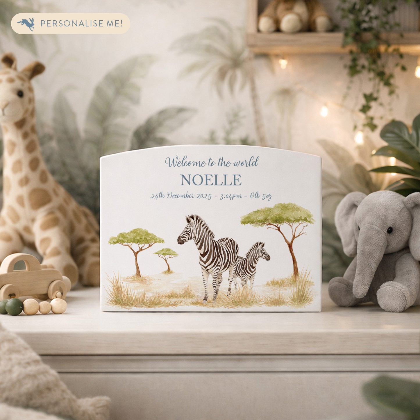 Zebra money box, mummy and baby animal design in the savannah. White arched money box.