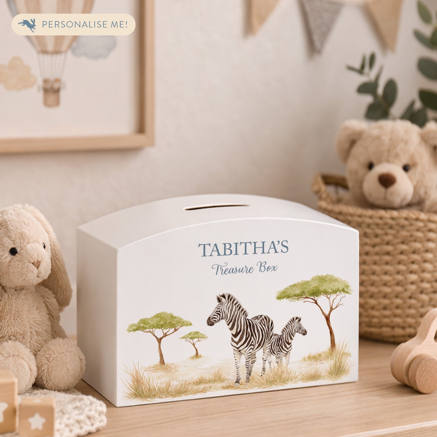 Zebra money box, mummy and baby animal design in the savannah. White arched money box.