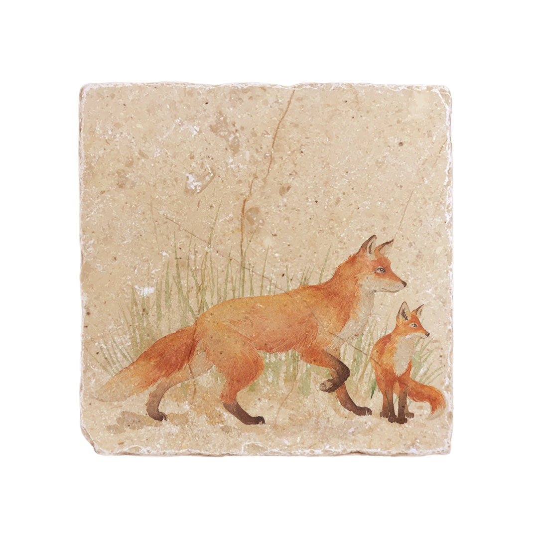 A handmade cream marble splashback tile featuring a watercolour countryside animal design of a fox and her fox cub in grass.